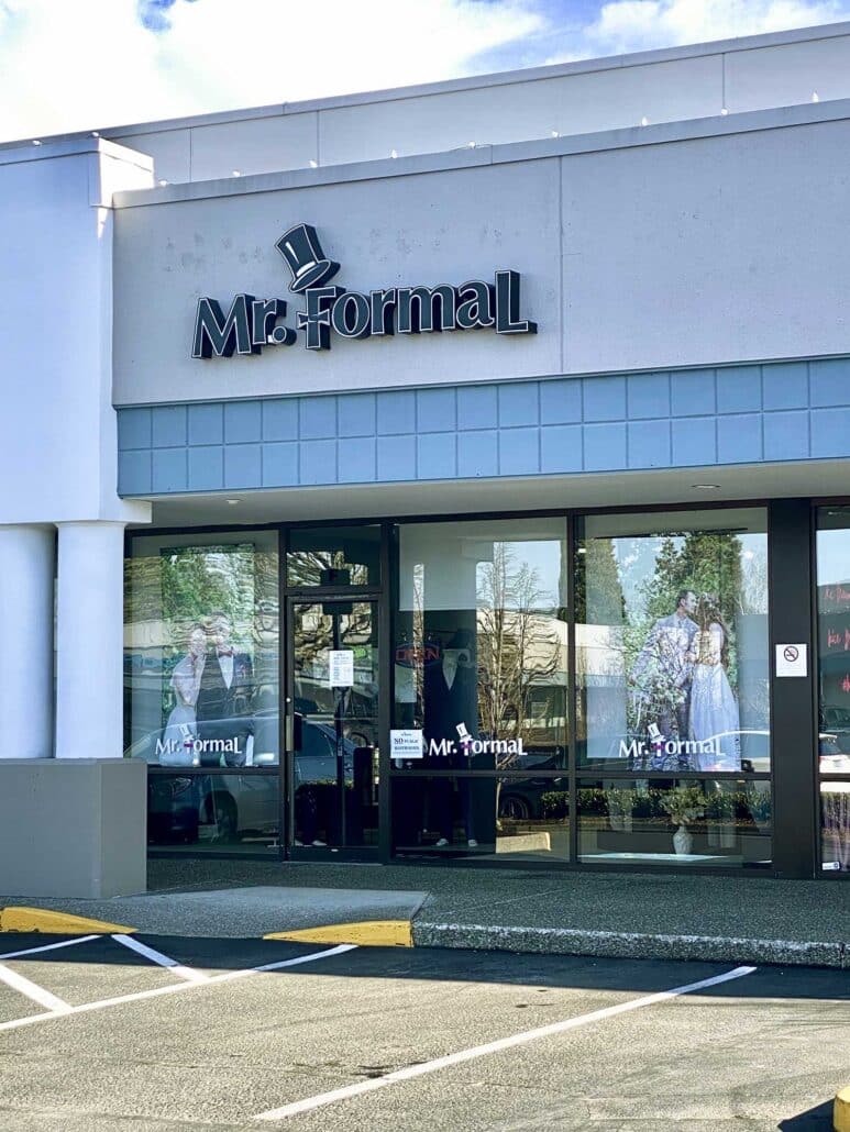The front of a store with a sign that says Mr. Formal, offering suit rental and tuxedo rental services.